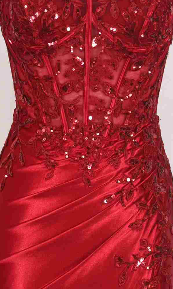Close-up of the PromGirl Exclusive 250275 long red stretch satin prom dress, featuring sequin lace embroidery, floral patterns, sheer paneling, and ruched details.